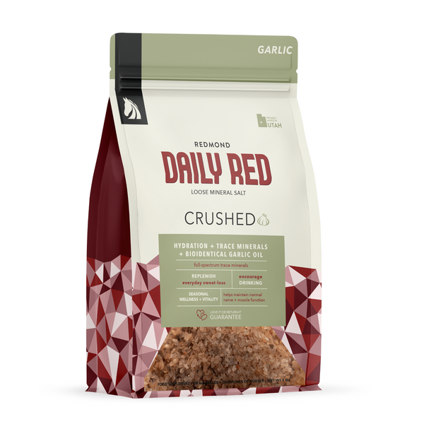 Daily Red Crushed Garlic small bag front, green top band reading Garlic, red pattern