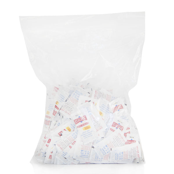 A transparent bag overflows with individually-wrapped servings of Real Salt, showcasing the brand's commitment to convenience. 
