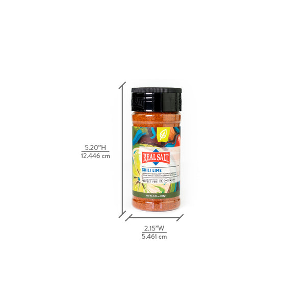 A jar of Real Salt Chili Lime Seasoning stands against a white background. 
